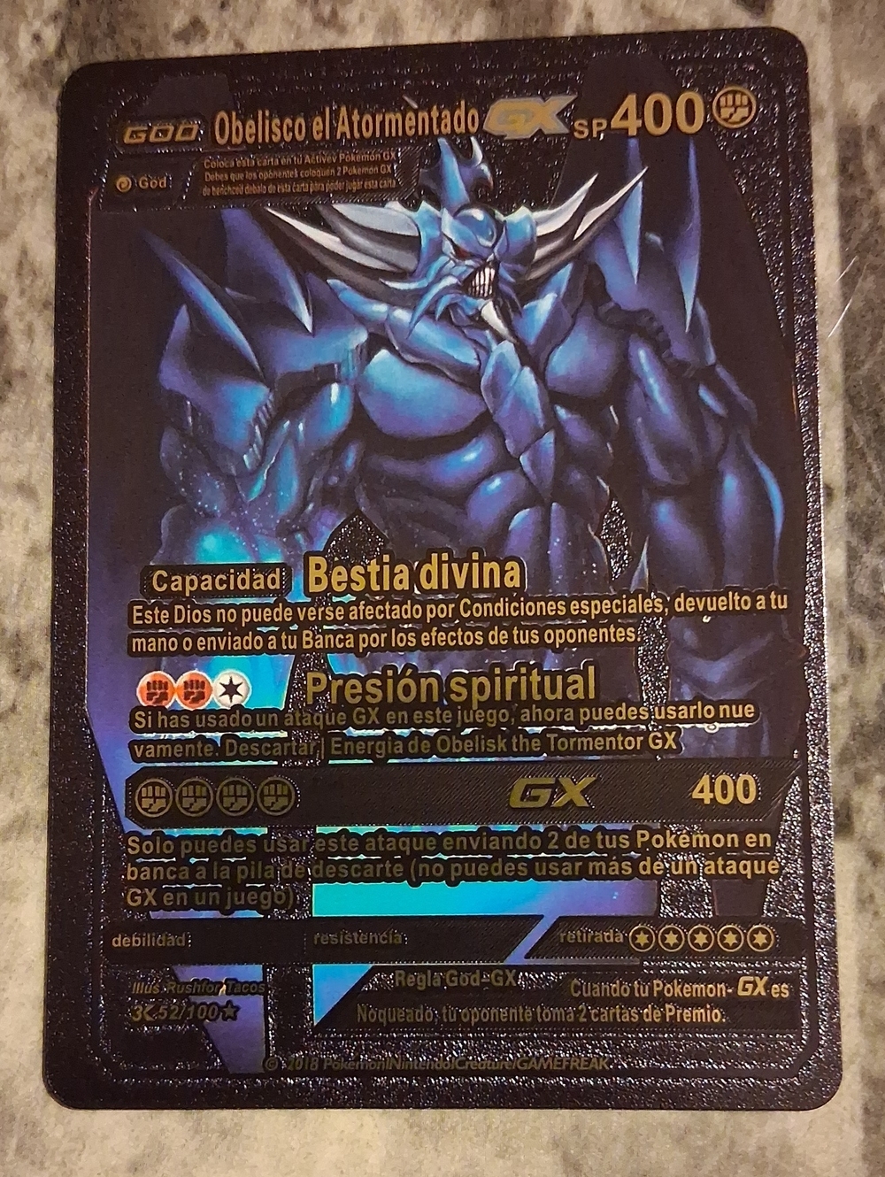 Obelisco el Atormentado GX Pokémon Holo Card — Deep Blue/Black